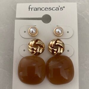 Francesca’s NWT set of 3 post earrings. Goldtone knots, faux pearl and tan stone